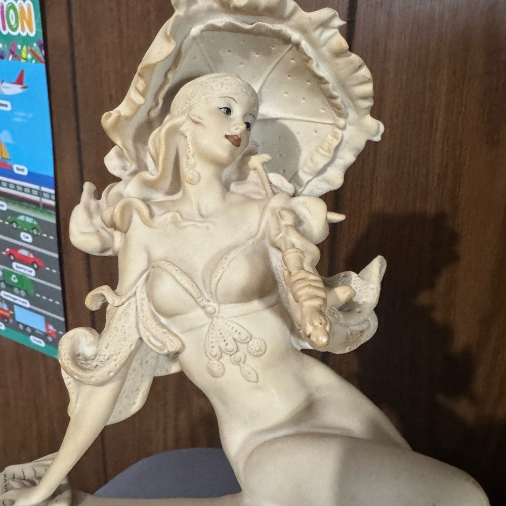Graceful Cream Art Sculpture